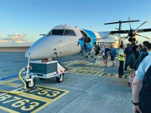 Anglers boarding a flight